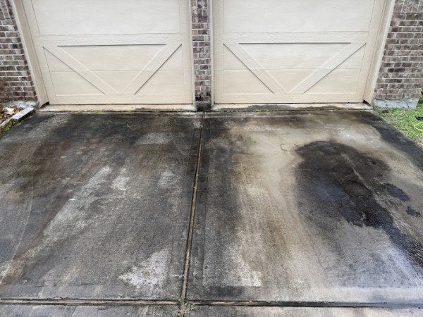 Driveway before pressure washing