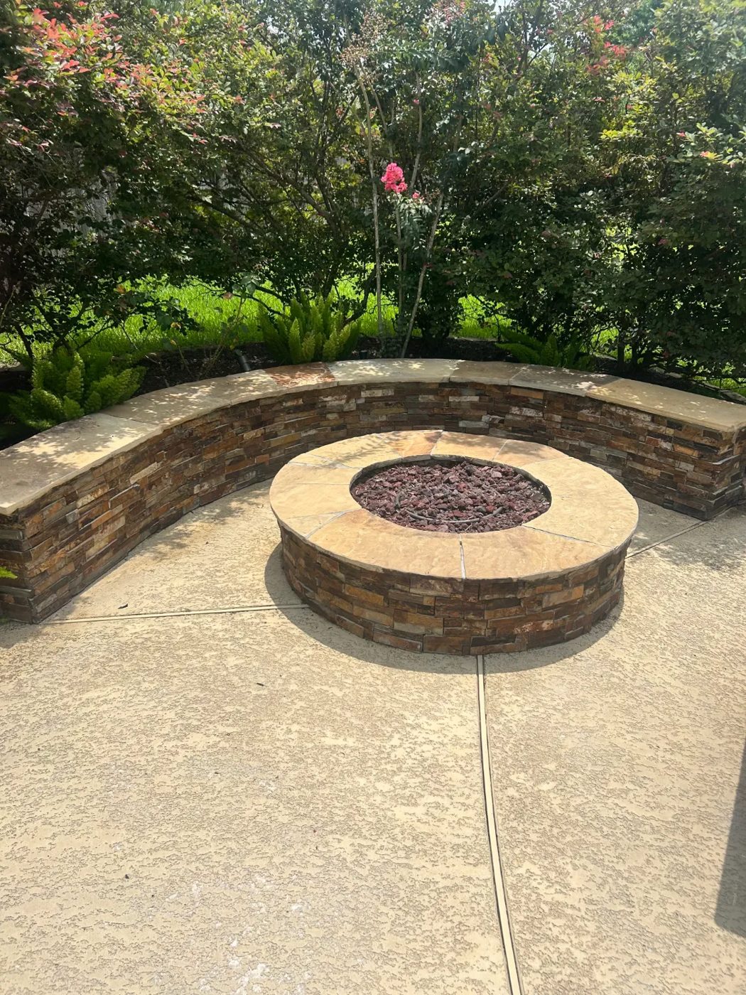 Clean stone fire pit and seat wall after soft washing